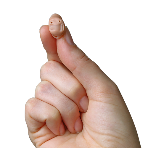 A hand holding a hearing aid in Columbus, OH